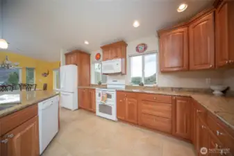 Huge gourmet kitchen. Granite counters and lots of custom cabinets.