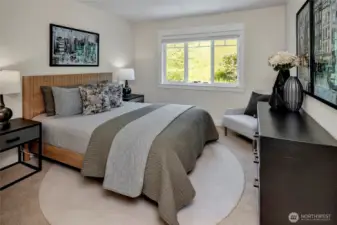 Three additional graciously sized bedrooms offer comfort and flexibility—perfect for family, guests