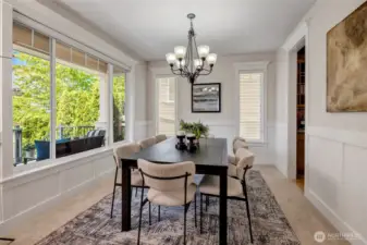 The formal dining room is perfectly sized for both elegant dinner parties and festive holiday gatherings like Thanksgiving—an inviting space to host and celebrate.