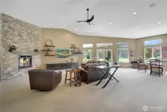 Floor to ceiling rock fireplace is a nice accent in the great room.