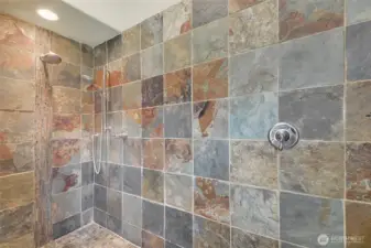 Full slate walk in shower in the primary bath is huge!