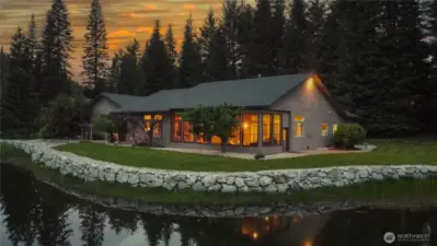 The screened in porch sits off the back of the home right on the pond giving you the perfect setting to relax without the bother of any bugs!