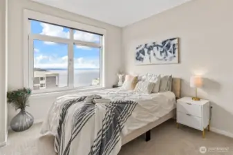The Primary Suite has amazing Elliott Bay views with the Olympics