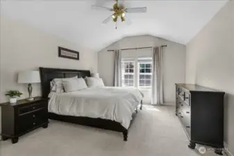 Primary Bedroom with French doors to Private Deck. Has 5 Piece Primary Bathroom Suite complete with Glass Surround Shower, Jetted Soaking Tub, and His & Her Sinks with walk In Closet