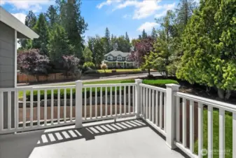 Primary Bedroom with French doors to Private Deck. Has 5 Piece Primary Bathroom Suite complete with Glass Surround Shower, Jetted Soaking Tub, and His & Her Sinks with walk In Closet
