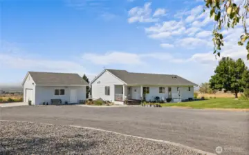 Home and detached two car garage. TONS of parking outside too!