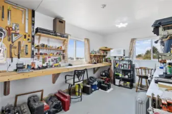 Inside shop work room, office, lots of built ins and storage! AC and Heat too!!!