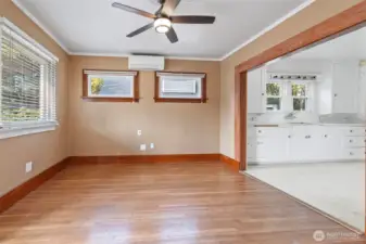 Living room with original fir floors and ductless heat pump
