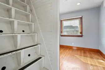 Stair ladder off the bedroom leads to the second floor