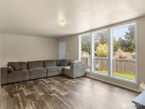 Wow! I love how this property has floor to ceiling windows which give you great views of the garden and yard.