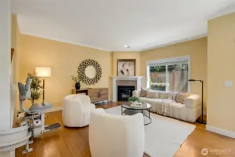 Spacious living room with large windows and cozy layout—enjoy natural light and relaxed comfort in your Kent WA condo.