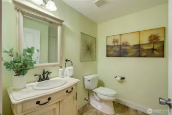 Spacious Half bathroom with large vanity on main level