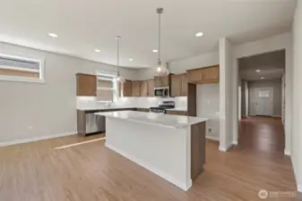 The dining room has two windows and lots of light.