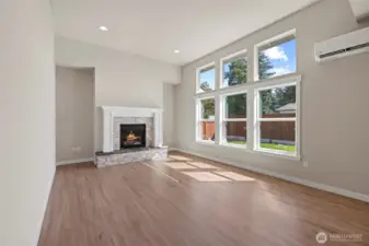 There's a gas fireplace with raised hearth.