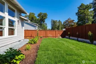 There is a fully fenced back yard.