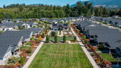 There is a clubhouse with an almost one acre park with a walking trail around it.