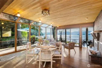 A look at the solarium skywall area at eh nook and  family room allowing the outside to come inside!  Absolutely magnificent views from all the rooms on the west side of the home.