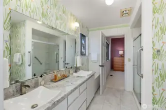 The guest suite has a Jack and Jill bath that connects to another room that can be used as a bedroom or private den/study/office.