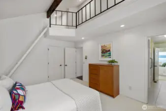 There is also a fun loft above this room which enjoys vaulted ceilings