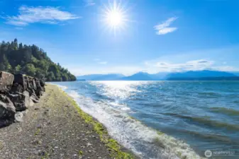 The beach is gorgeous and protected with a rock bulkhead.