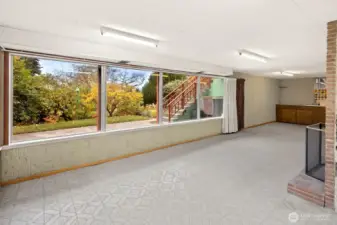 Bright walk-out rec room- huge potential here