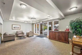 Entrance and sitting room to the clubhouse featuring a variety of condo amenities.