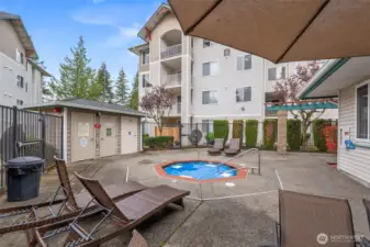 Condo amenities also include an outdoor hot tub.