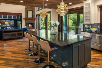 Nanawall doors open to the covered patio for seamless indoor-outdoor entertaining.