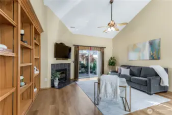 Notice the sliding door leading the beautifully landscaped backyard oasis.