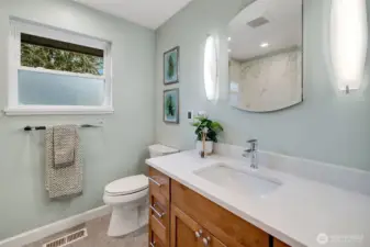 Updated bathroom with heated floor as well as toe kick heater under sink cabinet.