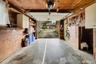 Unfinished space above garage with tankless water heater.