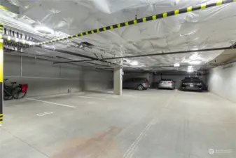 Dedicated secured parking. Space #6 with EV charger.