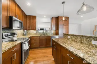 Granite countertops and Cherry cabinets