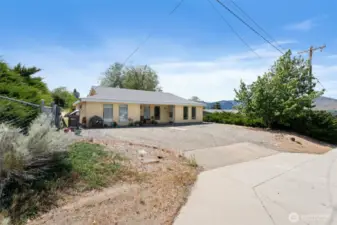 Could add carport to large entrance in front of duplex