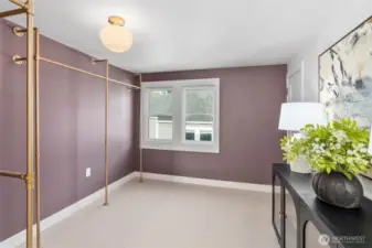 Open closet area offers tons of storage