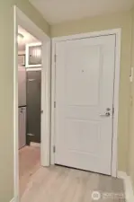 Entry door & laundry room.