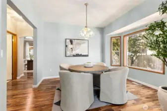 Dedicated dining room with new hardwood flooring with vaulted ceilings and bay window, so much natural light. Newly painted. Owners have also opted to use this room for multiple purposes such as formal living, study/office, den, playroom, library, media room, game room, etc.