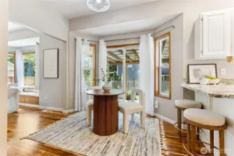 Breakfast nook leading to slider doors where you have a covered patio