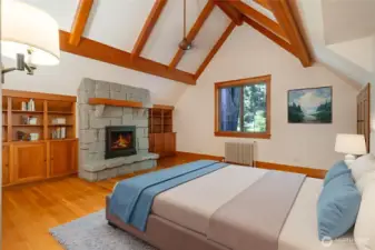 1 of 2 Primary Suites w/large walk in closet, fireplace and adj. full bathroom.