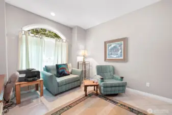 Main floor bedroom also functions as office/den