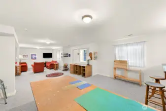 Daylight basement bonus room w/ exterior access to backyard & beach