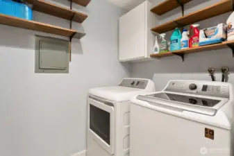 Full size washer/dryer plus room for storage in the laundry room near front entrance.