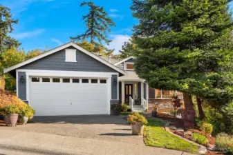 Welcome to this Woodmont custom home that is much larger than it appears. Located on a private dead end street of pride-of-ownership homes.