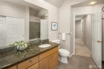Upstairs hall bathroom with dual sinks, and a lovely shower over the bath tub