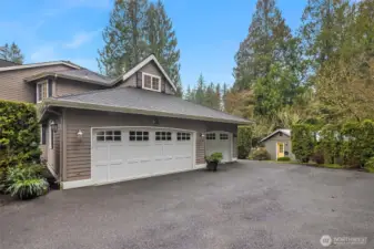A big attached 3 car garage with lots of storage space & work shop / There is also a separate guest parking  area & designated spot for your boat or RV parking.