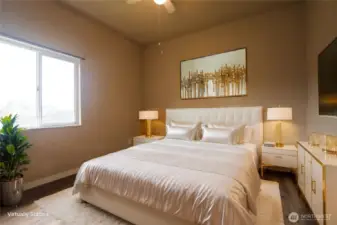 Bedroom 2 of 3 staged