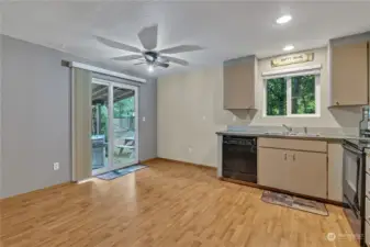 Open kitchen with eating space.