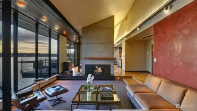 Enter at the main level to walls of glass overlooking westerly views of Lake Washington