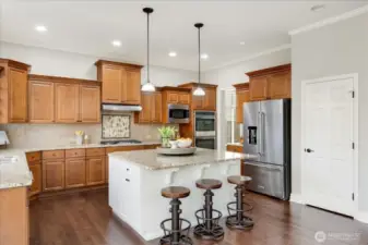 Don't miss the walk-in pantry with custom adjustable shelving