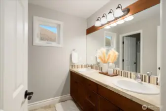 Second floor full guest bathroom #1, with private shower/tub/water closet.